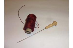 Abrollhilfe fr Garn und Umstecknadel